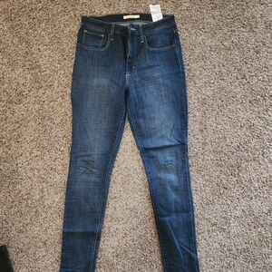 Levi's 721 High Rise Blue Skinny Jeans with Stretch and Faded Details